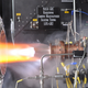 Liquid oxygen/gaseous hydrogen rocket injector assembly built using additive manufacturing technology is hot-fire tested at NASA Glenn Research Center’s Rocket Combustion Laboratory in Cleveland, Ohio.
